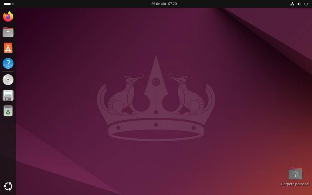 Interface de bureau GNOME 45 sur Ubuntu 24.04, montrant les applications verticales gauche vers la gauche et le papier peint prédéterminé.